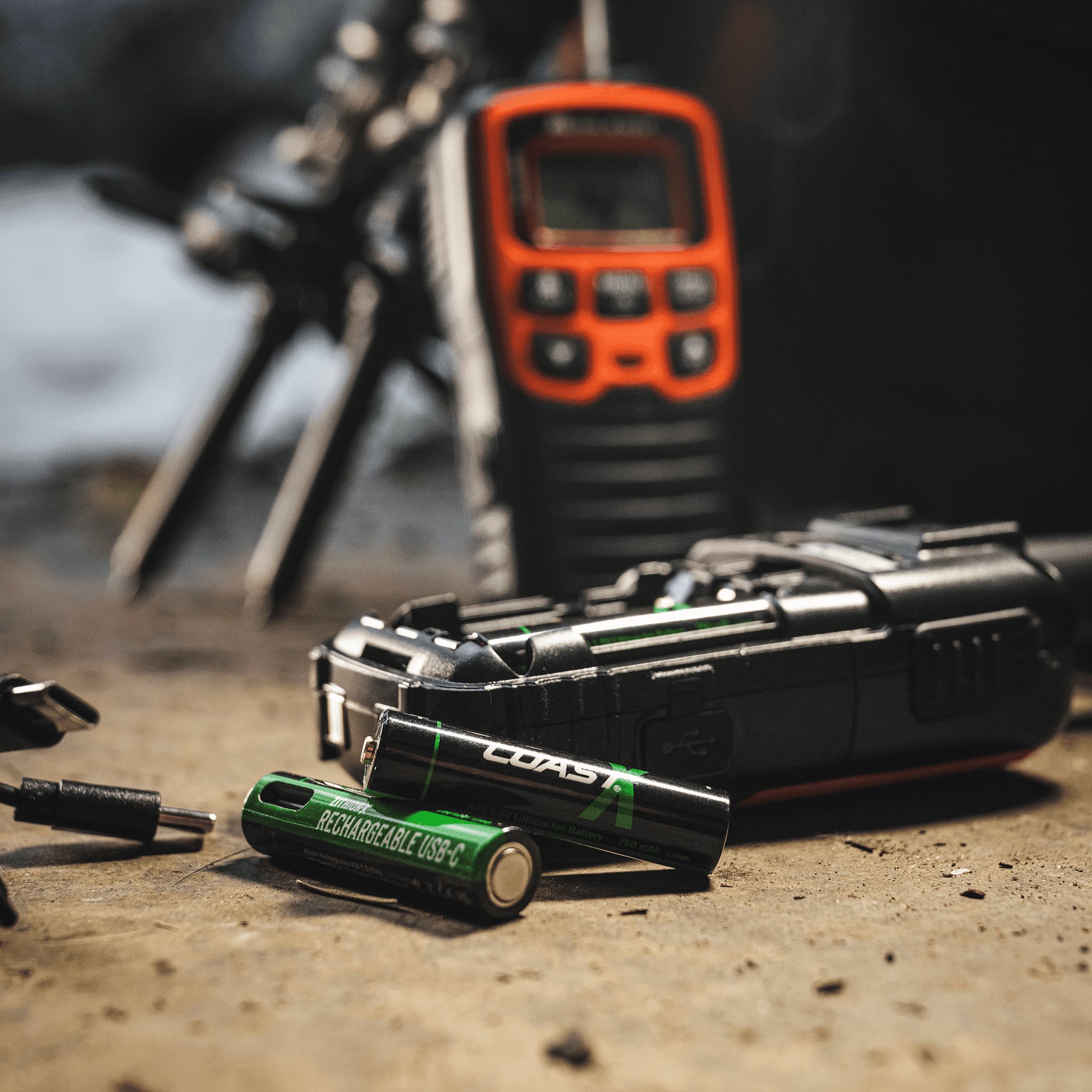 batteries in front of a walkie talkie